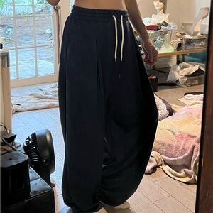 Elegant Super soft Sweatshirt material Navy joggers w drawstring cuffs & pockets